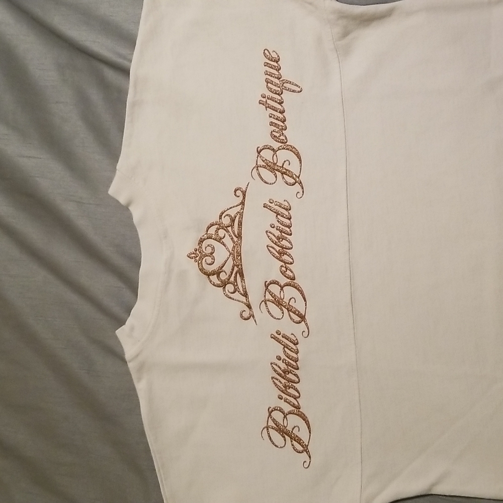 Disney's Bibbidi Bobbidi Boutique white Jersey shirt.